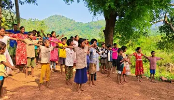 "Set up an Anganwadi center in our village": Tribal students' appeal through an innovative yoga pose.