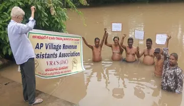 VRAs staged a protest by observing a 'Jala Deeksha' (water-based protest).