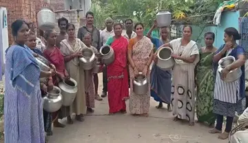 Rally by Dalit, tribal, and poor women with empty pots.