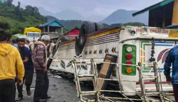 Bus overturns; seven dead.