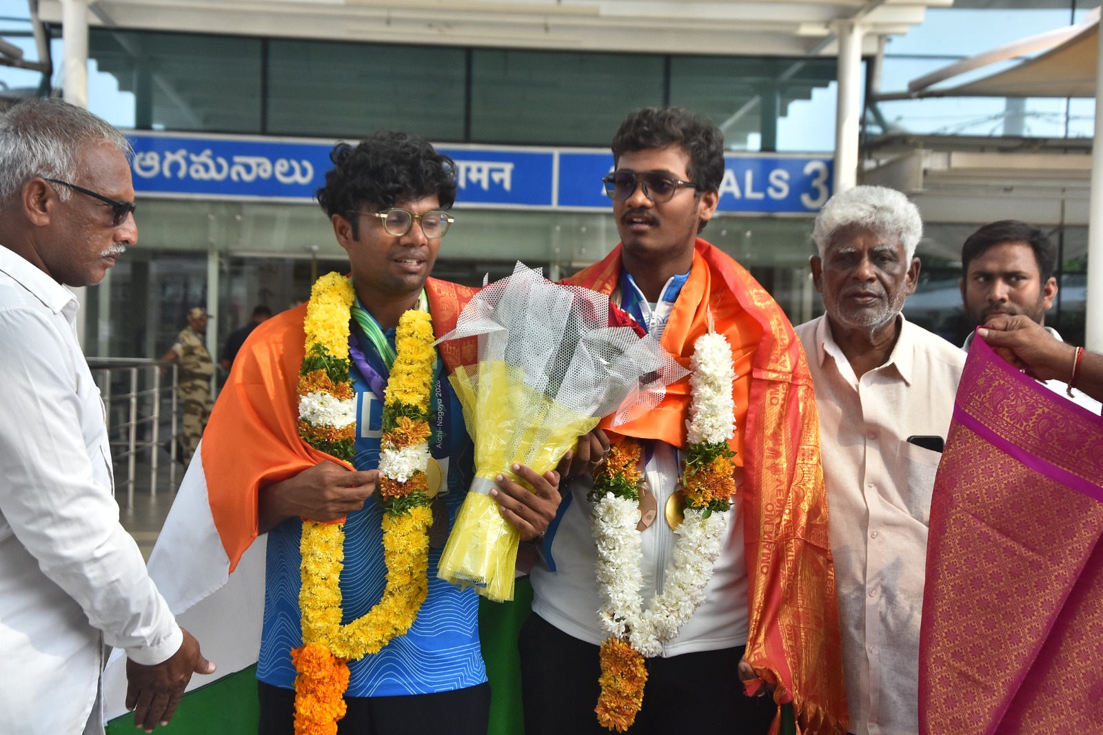 ​అంతర్జాతీయ ఆర్చర్లు  ధీరజ్, గణేష్‌లకు ఘన స్వాగతం image 1