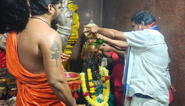 Abhishekam performed for Goddess Nookambika with river water.