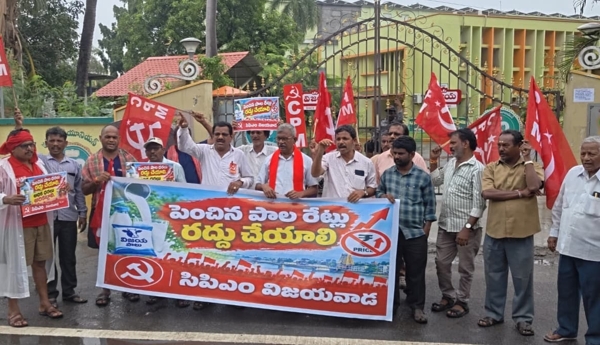 CPM protest and dharna against the hike in milk prices.
