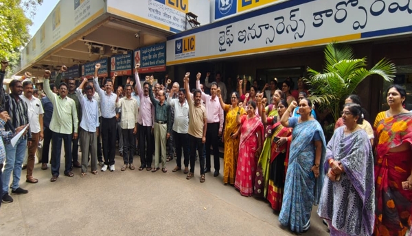 Employees stage protest against the sale of further stakes in LIC.