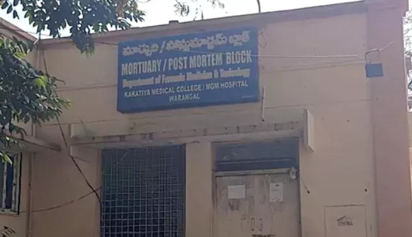 Rats gnaw on a body in the mortuary.