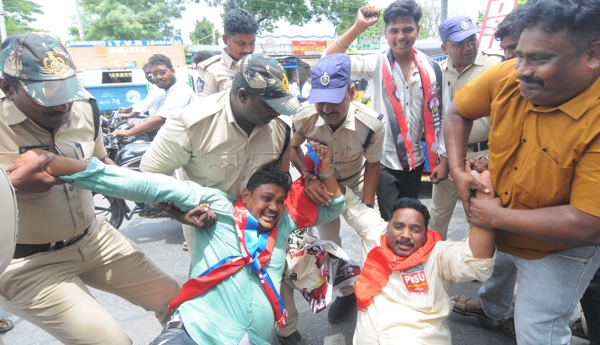 Protest over NEET irregularities – Police drag protesters away