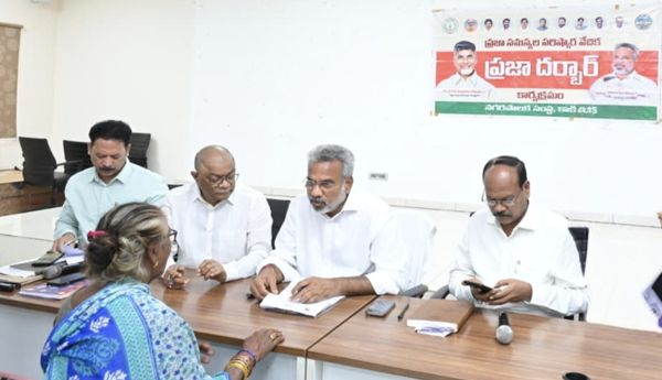 Resolving public issues is the goal: MLA Vanamadi Kondababu at the public grievance meeting.