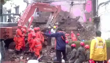 Six dead after four-storey building collapses.
