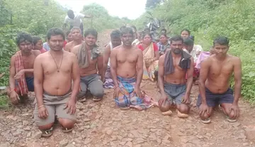 Tribals stage semi-nude protest over official apathy.