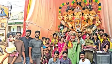 Religious Harmony – Muslim Couple Receives Laddu Prasadam