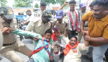 Protest over NEET irregularities – Police drag protesters away