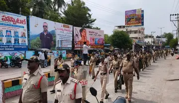 Police flag march in the run-up to the elections...