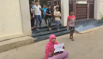 Day 5 – Taushik’s mother, Maulabi, wages a legal battle in front of the school.