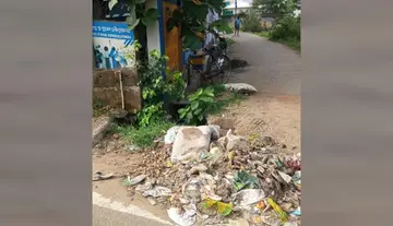 Contaminated drinking water... a drain right next to it... accumulating garbage...