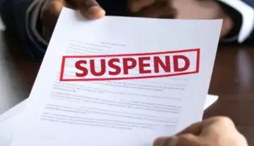 Teacher suspended for inappropriate behavior towards students.