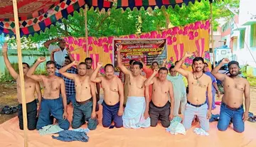 VRAs protest by sitting on their knees half-naked